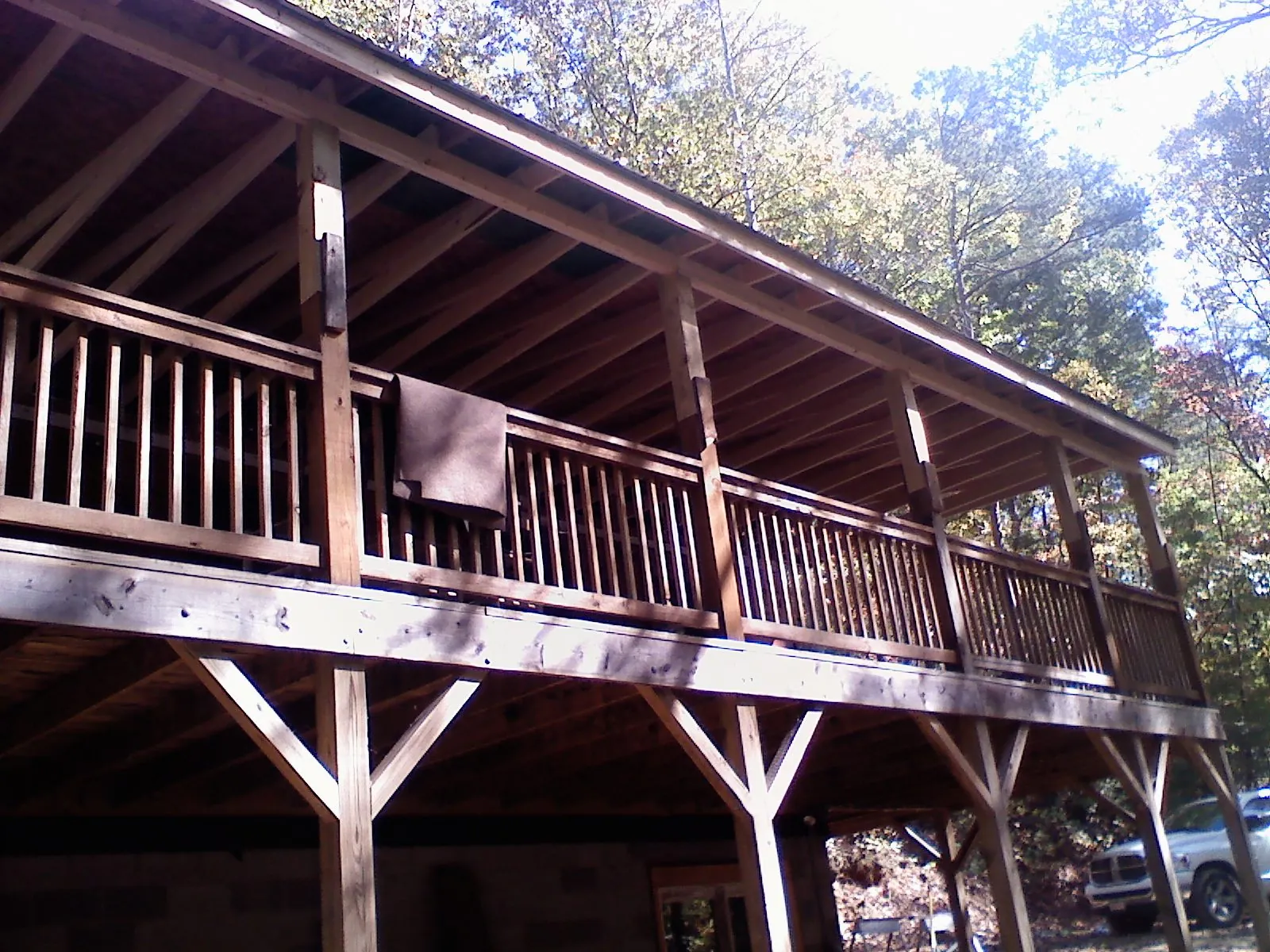 Timber framing under a new elevated porch and deck — Roof Leak Repair in Grand Meadow by Roofing Brothers